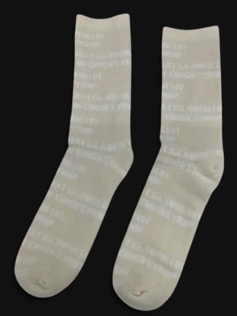 THAT'S A AWFUL LOT OF COUGH SYRUP CREAM/WHITE SOCKS ONE SIZE NEW UNRE
